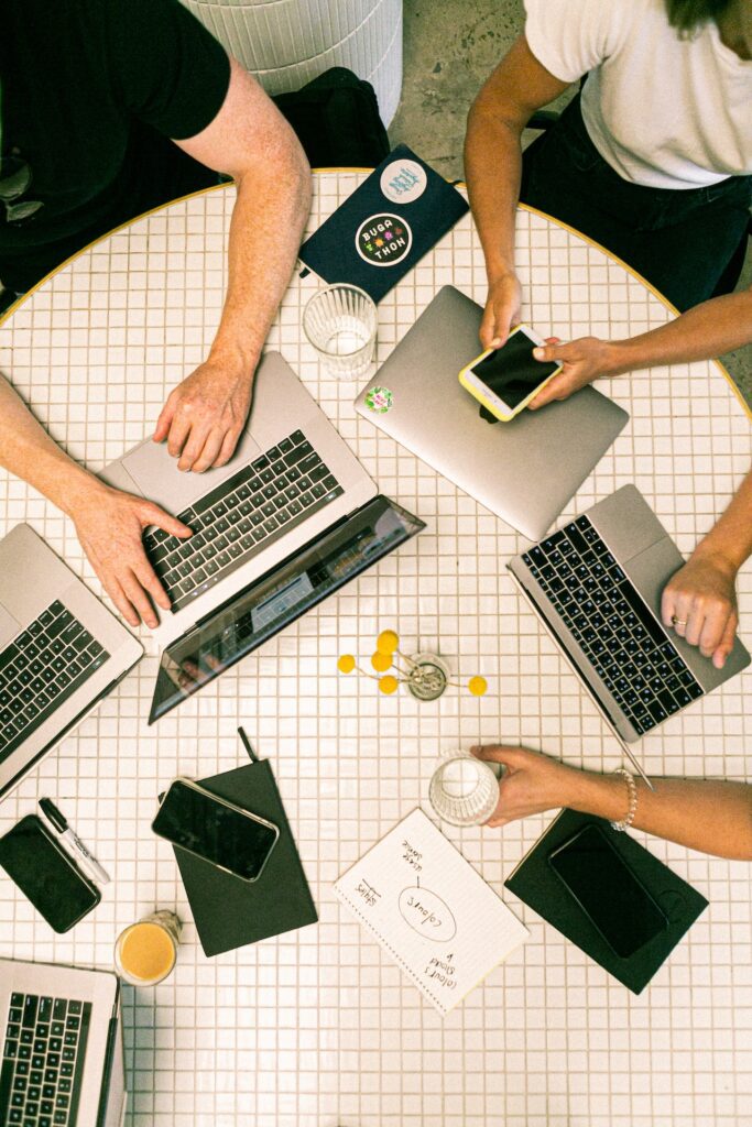 Collaborating around a table - SEO Meeting