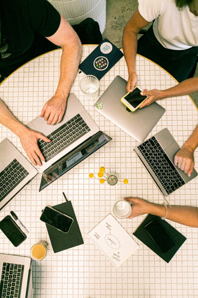 Collaborating around a table - SEO Meeting